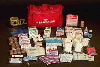 The Responder Kit ~ 25 Person Kit- 1 "D" Flashlight with Batteries, One 15 Piece Bloodborne Pathogens Kit, Eyewash, Hydrogen Peroxide, 100 Medium Butterfly Bandages, One Hundred 1x3 Bandages, 100 Non Aspirin, 1 Burn Free Dressing, 25 Sanidex, 25 Antiseptic Towellettes, 5 Eye Pads, Five 5x9 Combine Dressings, 5 Blood Stoppers, 1 First Aid Cream, Two 1x10 Adhesive Tape, 1 Triangle Bandage, 12 2x6 Sterile Gauze Bandages, One 3" Ace Bandage, 1 Solar Blanket, Twelve 4x4 Gauze Bandages, One 300' Caution Tape, 1 Sterile Pouch Water, 4 Ice Packs, 2 Safety Vests, 1 CPR Mouth Piece