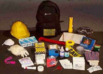 The Small Office or Classroom Kit- Food Bars, Water, Solar Blanket, Whistle, Flashlight with 20 year Batteries, Goggles, Clipboard, Pencil & Accountability Forms, AM Radio, Dust Mask, Pry Bar, Duct Tape, Caution Tape, Hard Hat, Work Gloves, Safety Vest, CPR Mouth Piece, Piece Pack, Burn Spray, Gauze, Bandages, Tape, Etc.